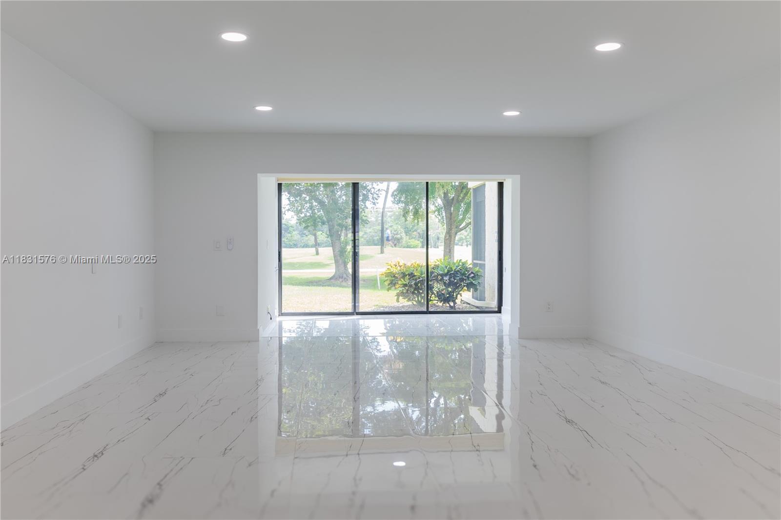 8435 Casa Del Lago, Unit 22C Boca Raton, FL 33433 - Photo 15 of 55 an empty room with a window