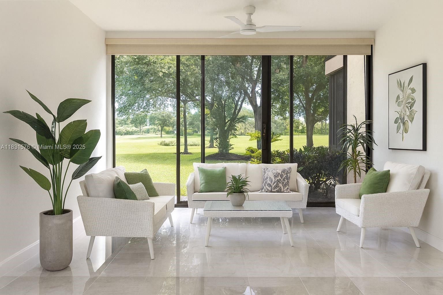 8435 Casa Del Lago, Unit 22C Boca Raton, FL 33433 - Photo 16 of 55 a living room with furniture and a large window