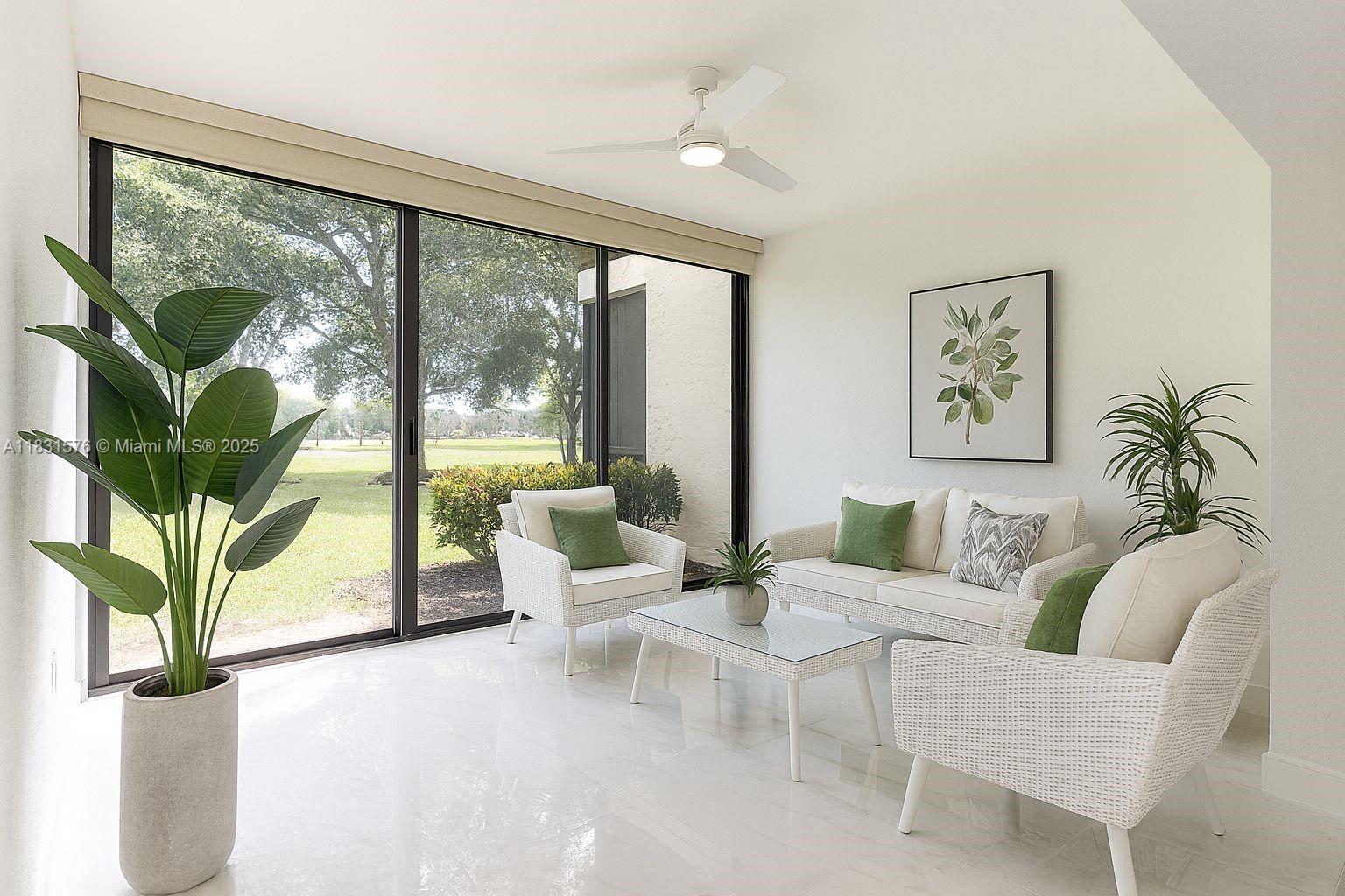 8435 Casa Del Lago, Unit 22C Boca Raton, FL 33433 - Photo 19 of 55 a living room with furniture large window with outer view