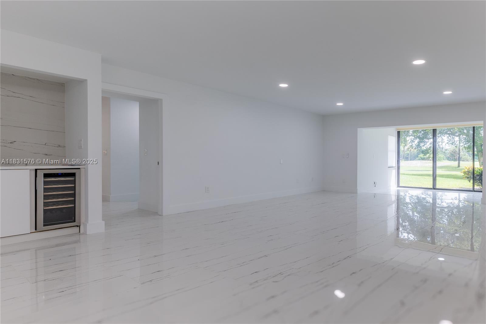 8435 Casa Del Lago, Unit 22C Boca Raton, FL 33433 - Photo 21 of 55 a view of an empty room with a window