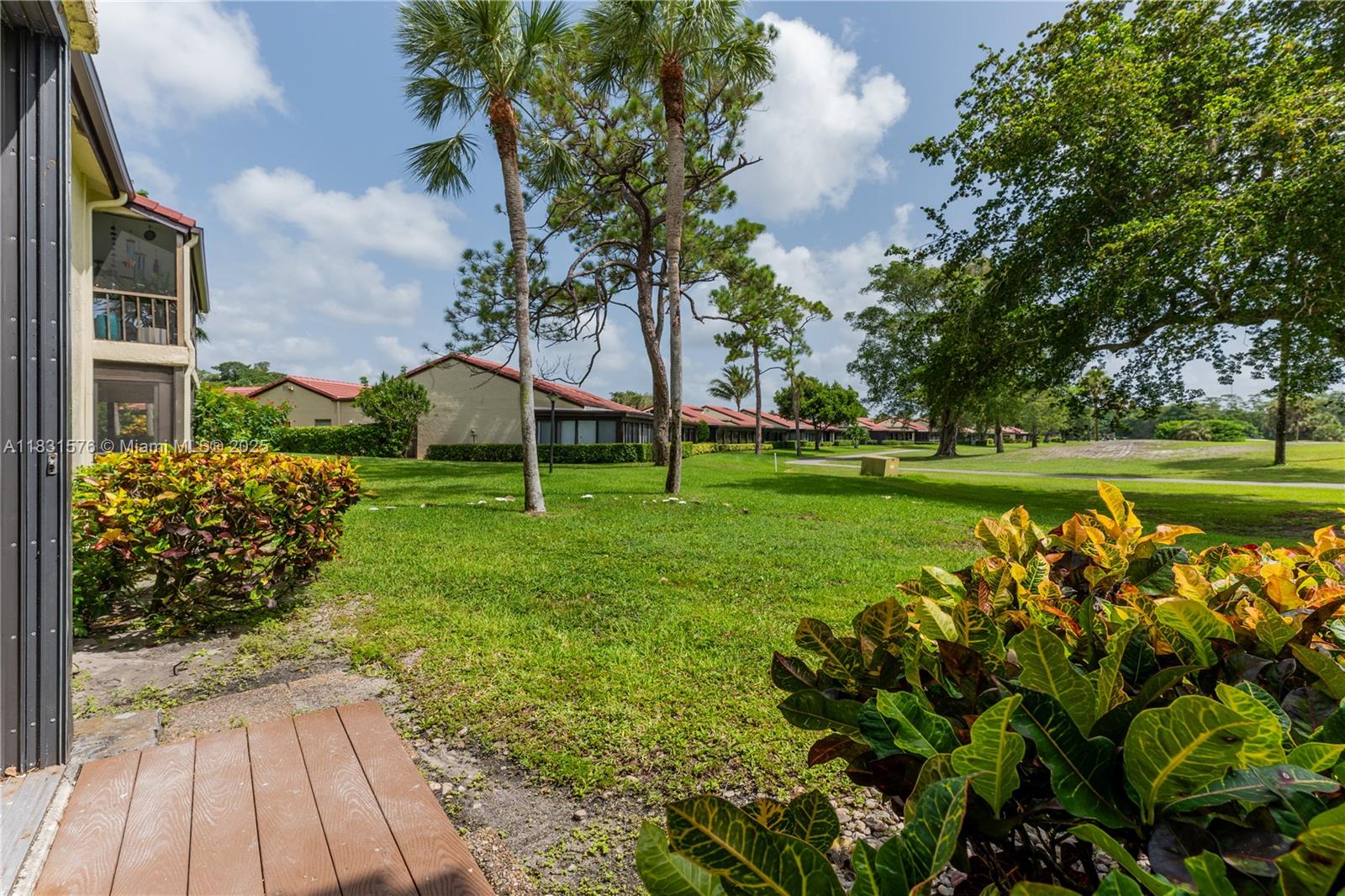 8435 Casa Del Lago, Unit 22C Boca Raton, FL 33433 - Photo 46 of 55 a view of a park with large trees