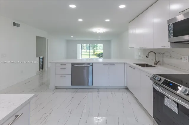 a view of a dining room with furniture