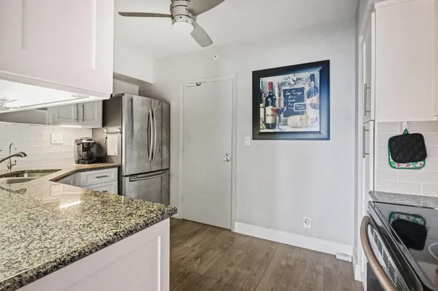 a kitchen with a stove and a microwave