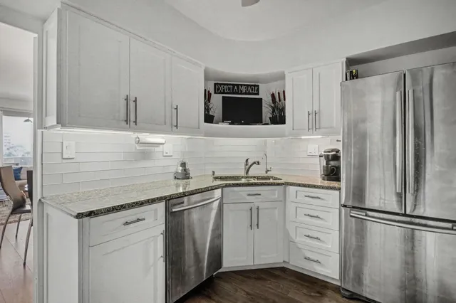 a kitchen with a stove and a microwave