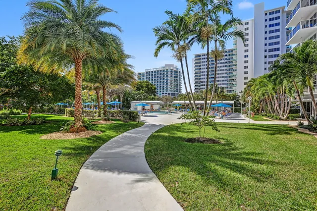 a reading room with furniture and book shelf