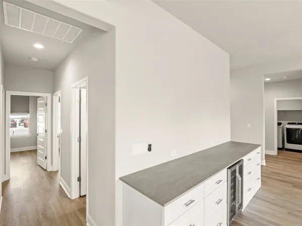 a kitchen with sink and window