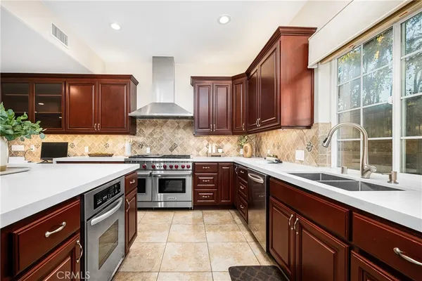 a view of a hallway with wooden shelves