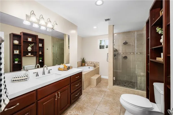 a view of a house with patio outdoor seating area