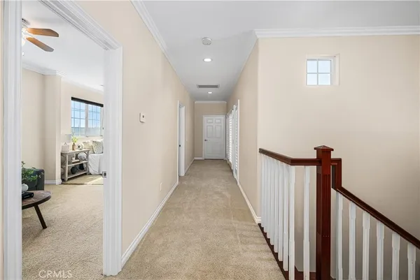 an aerial view of a house with a yard basket ball court and outdoor seating