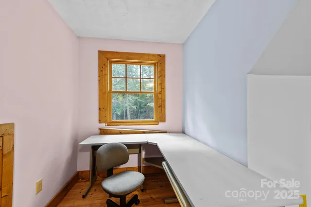 a room with furniture and a window