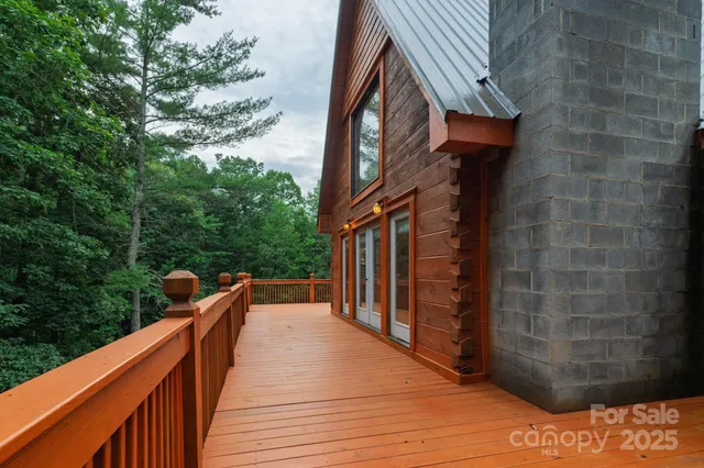 a view of a wooden roof deck