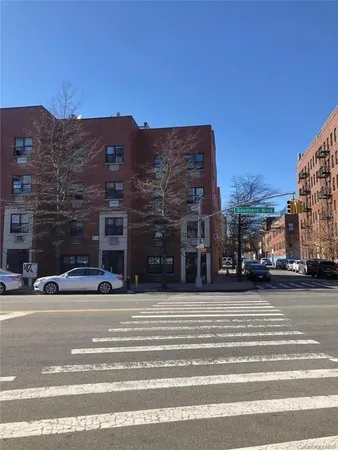 a view of a building with a road