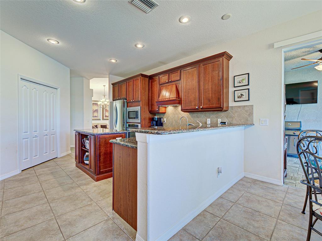 12082 Granite Woods Loop Venice, FL 34292 - Photo 10 of 87
