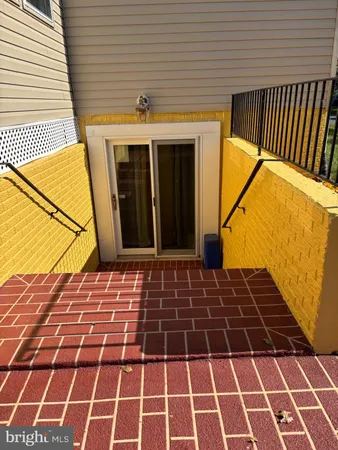 a view of a balcony with a door