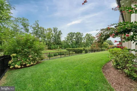 a room that has a window and a bed in it