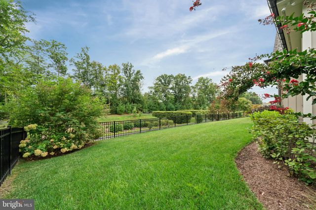 a room that has a window and a bed in it