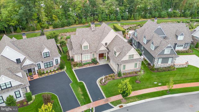 an aerial view of a house with a garden