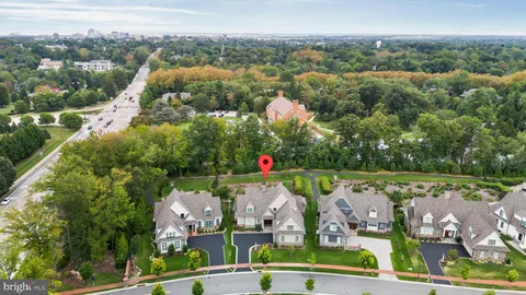an aerial view of a house with a garden and plants