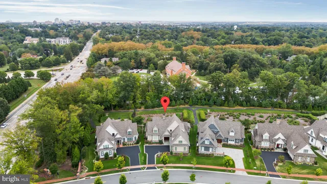 an aerial view of a house with a garden and plants
