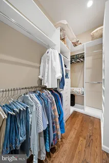 a view of a room with a wooden floor