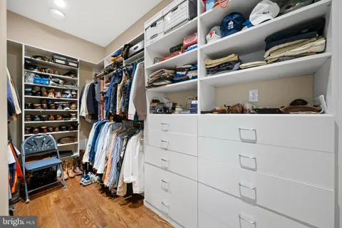 a living room with dining table and chairs