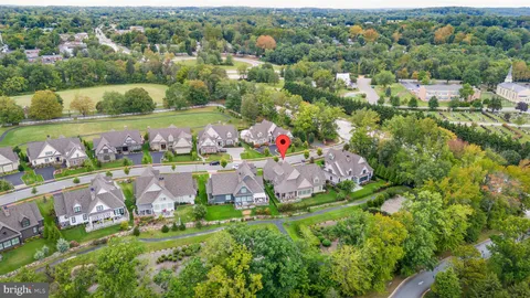 a view of a house with a yard and garage