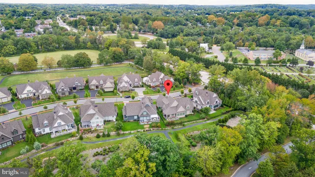 a view of a house with a yard and garage