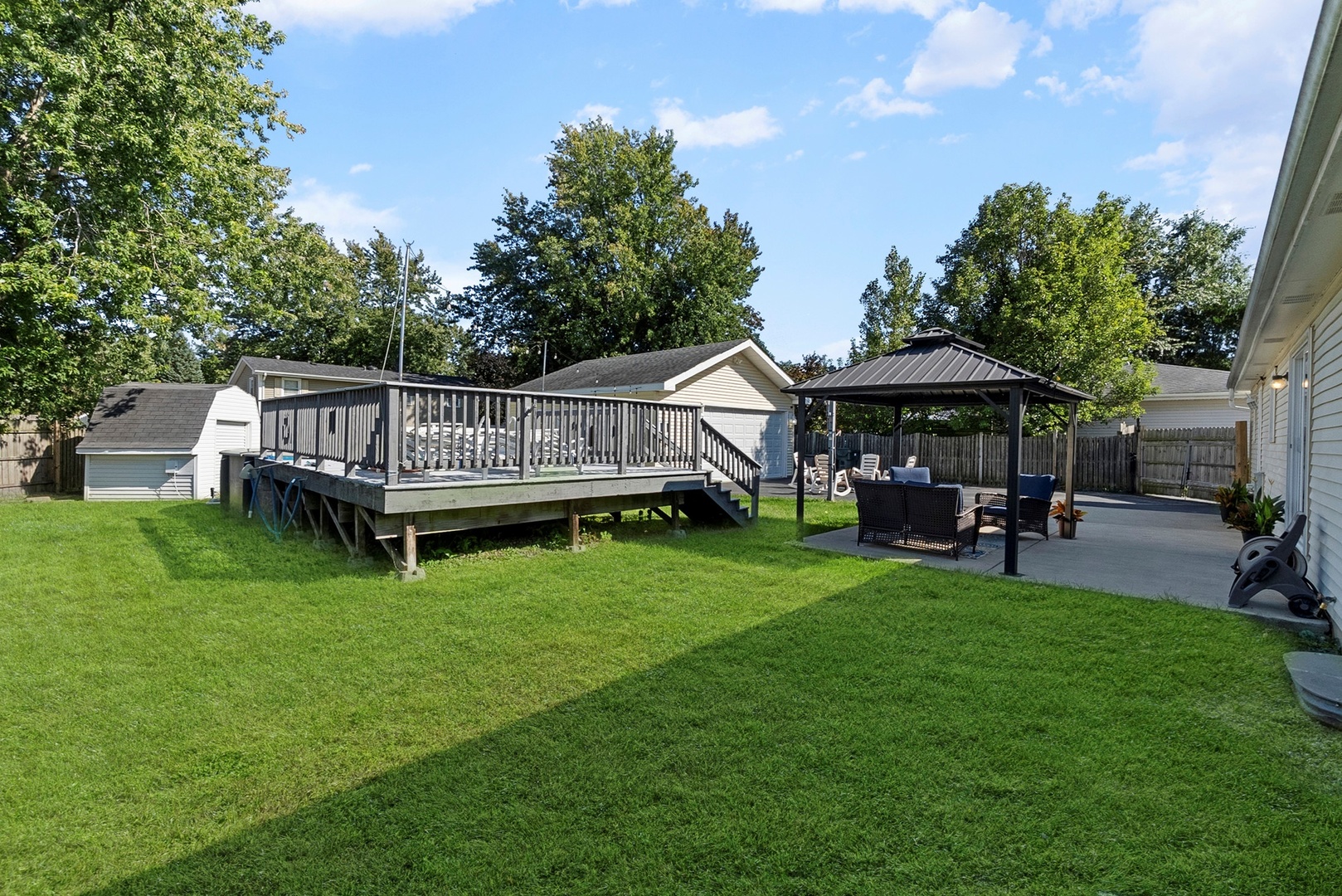 808 Stonegate Road New Lenox, IL 60451 - Photo 21 of 24 a view of an house with backyard and sitting area