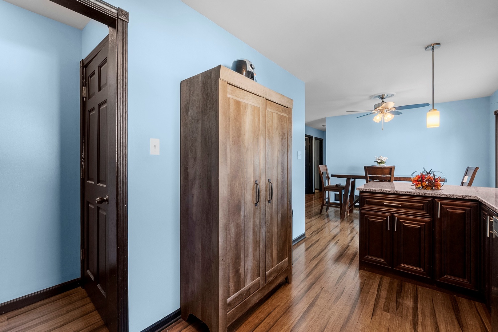 808 Stonegate Road New Lenox, IL 60451 - Photo 6 of 24 a kitchen with wooden cabinets and sink