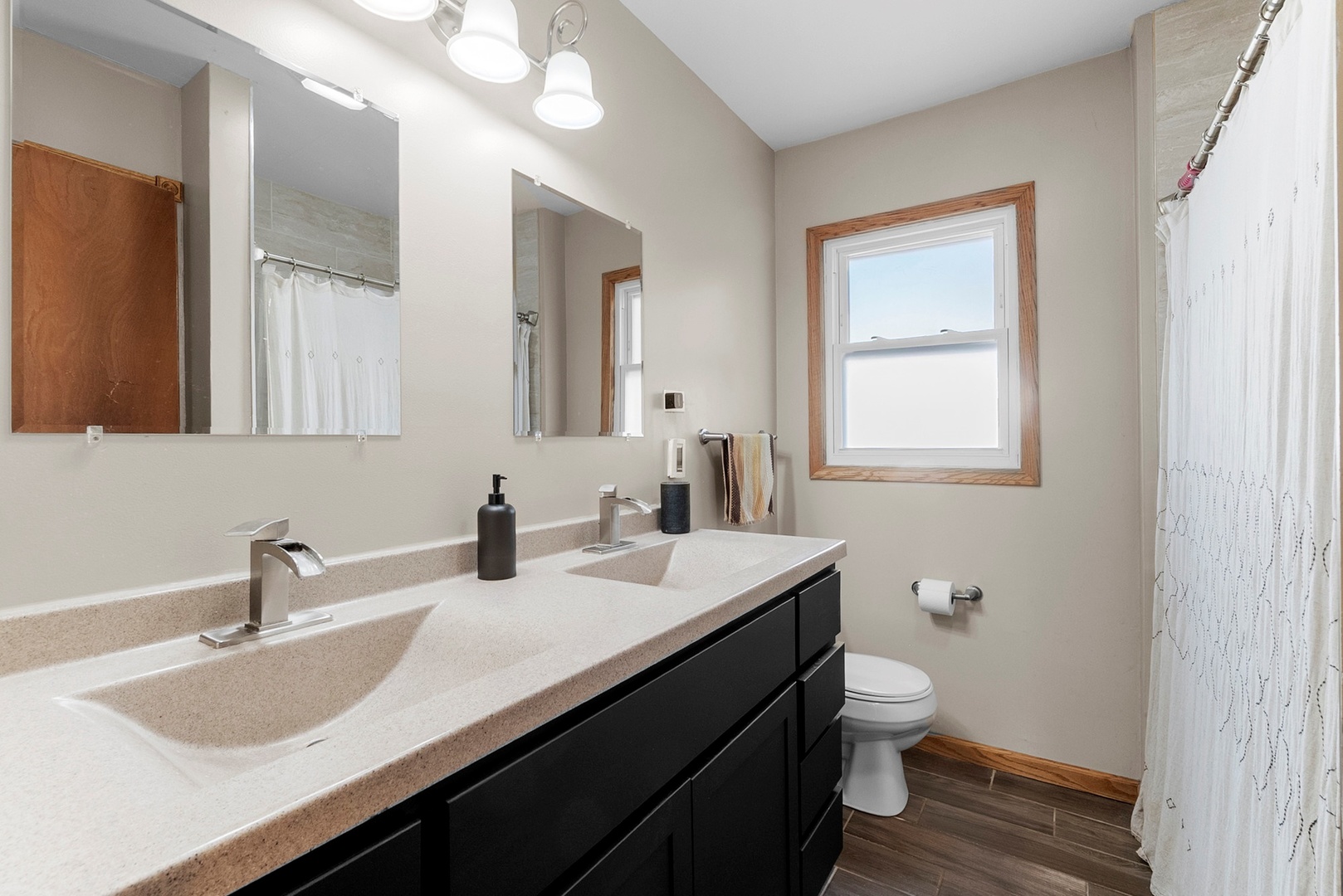 808 Stonegate Road New Lenox, IL 60451 - Photo 9 of 24 a bathroom with a sink double vanity and a toilet