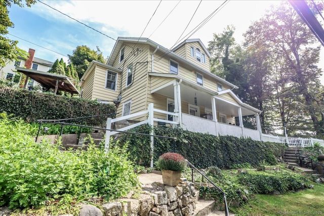 a house with trees in front of it