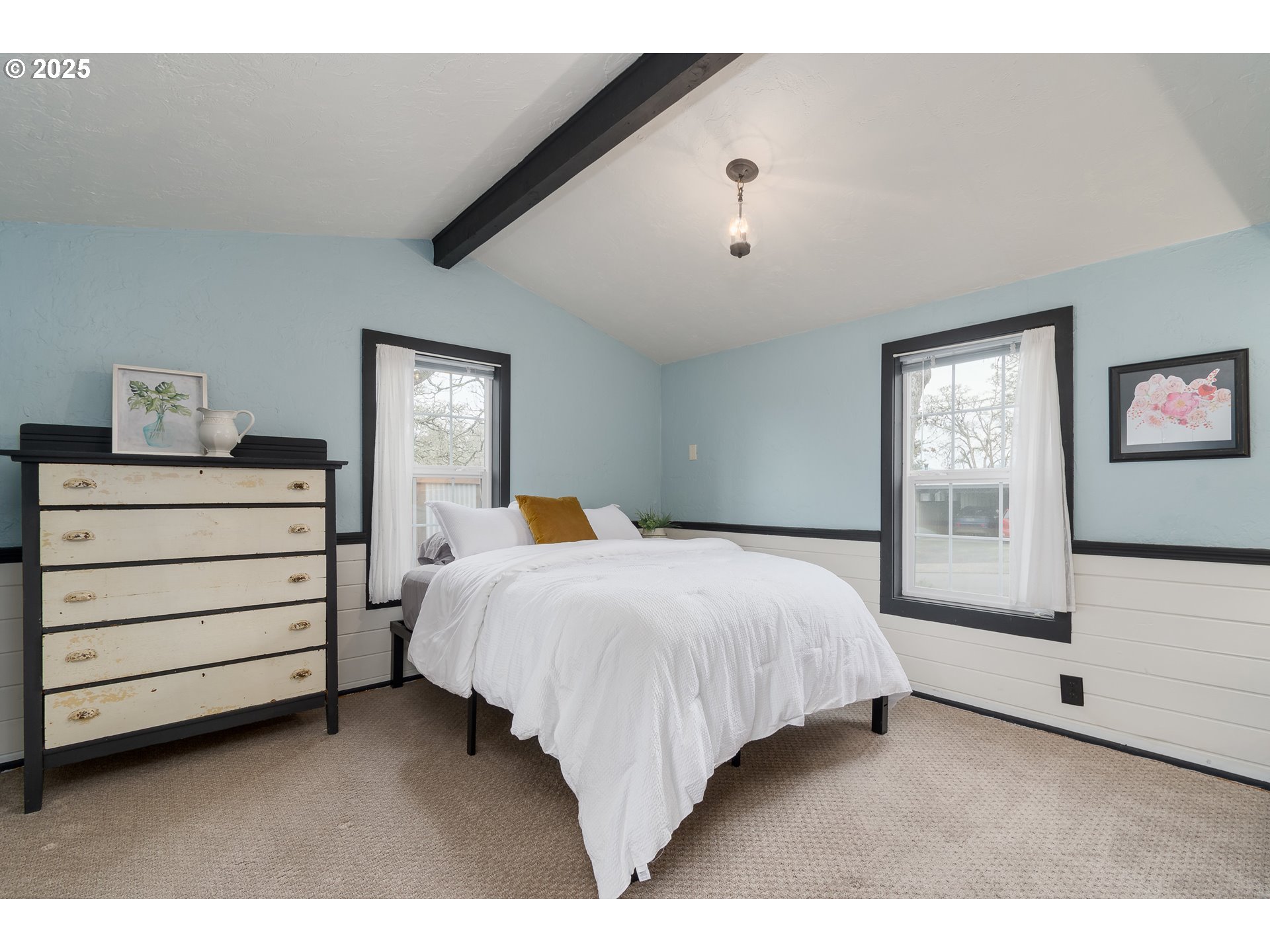 25 West 36th Avenue Eugene, OR 97405 - Photo 19 of 33 a bed room with a bed and a dresser