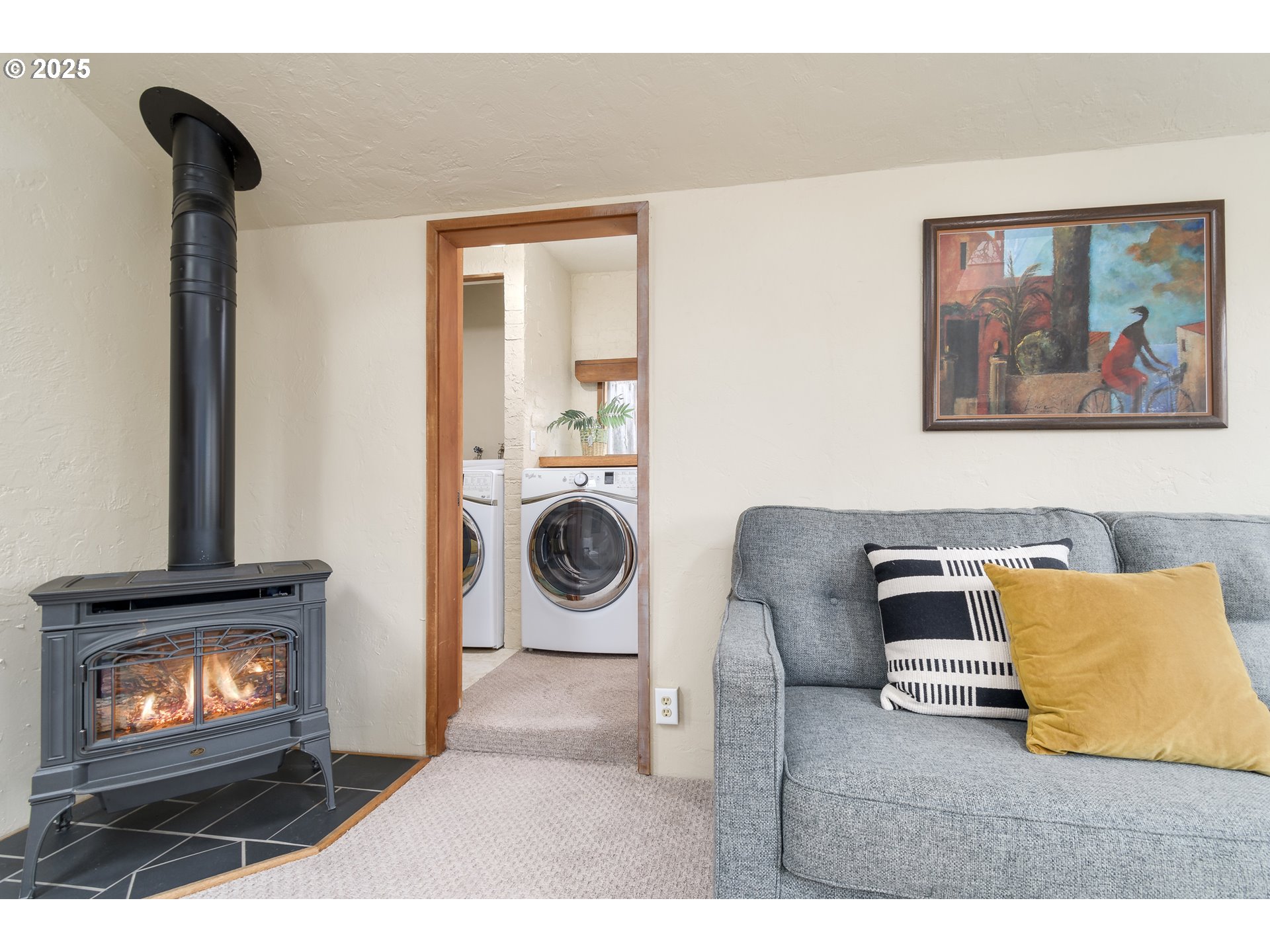25 West 36th Avenue Eugene, OR 97405 - Photo 21 of 33 a living room with furniture and a fireplace