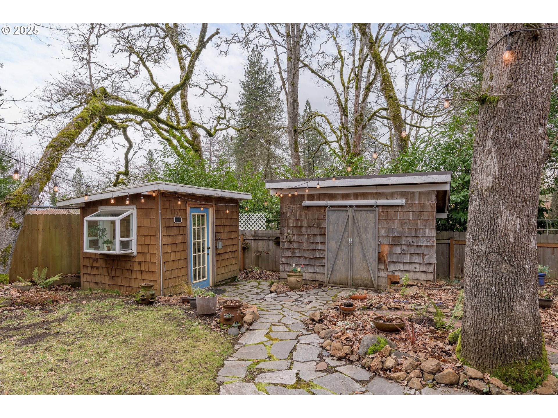 25 West 36th Avenue Eugene, OR 97405 - Photo 27 of 33 front view of a house with a large tree