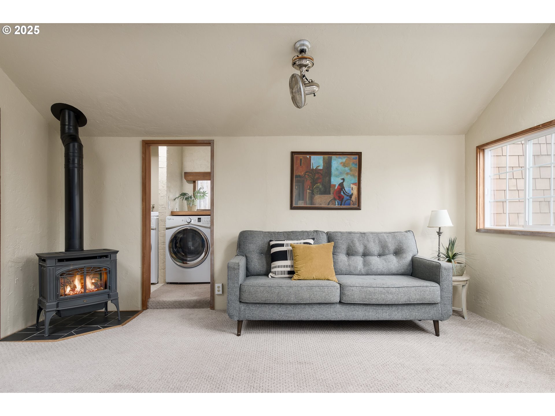 25 West 36th Avenue Eugene, OR 97405 - Photo 6 of 33 a living room with furniture and a fireplace