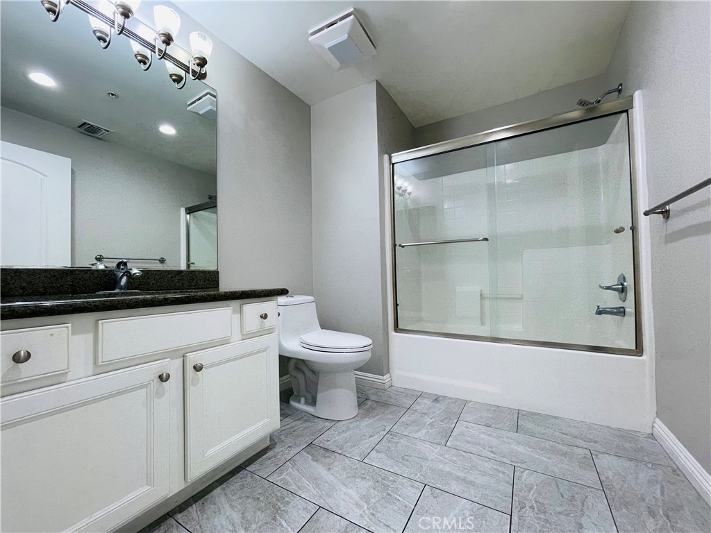 6800 Corbin Avenue Reseda, CA 91335 - Photo 23 of 37 a bathroom with a toilet sink and shower