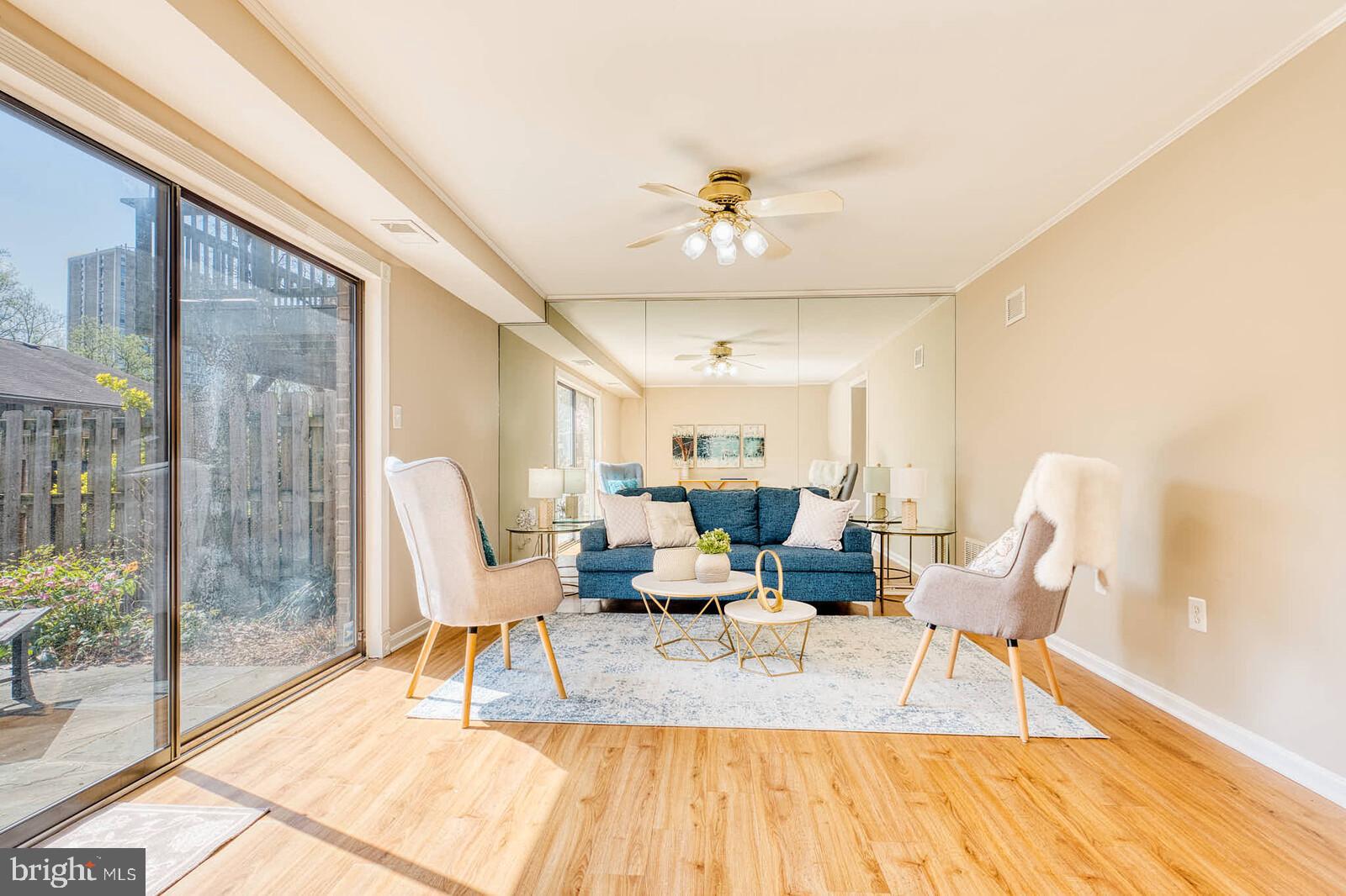 9238 Three Oaks Drive Silver Spring, MD 20901 - Photo 34 of 42 a living room with furniture