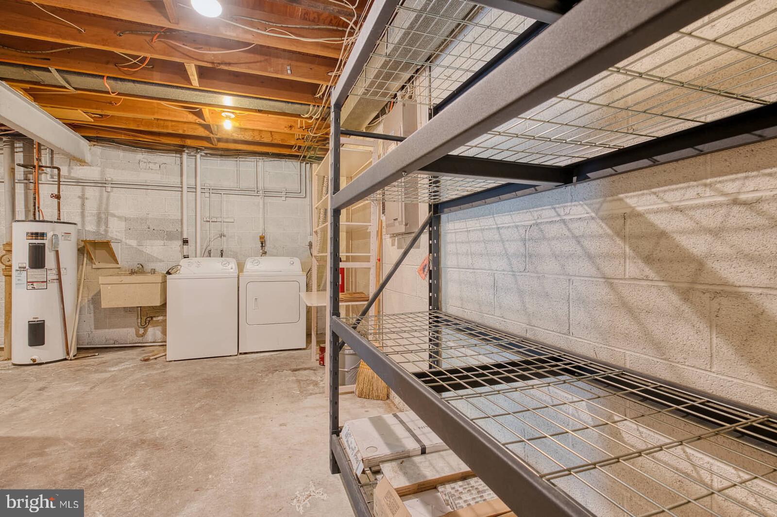 9238 Three Oaks Drive Silver Spring, MD 20901 - Photo 37 of 42 a utility room with dryer and washer