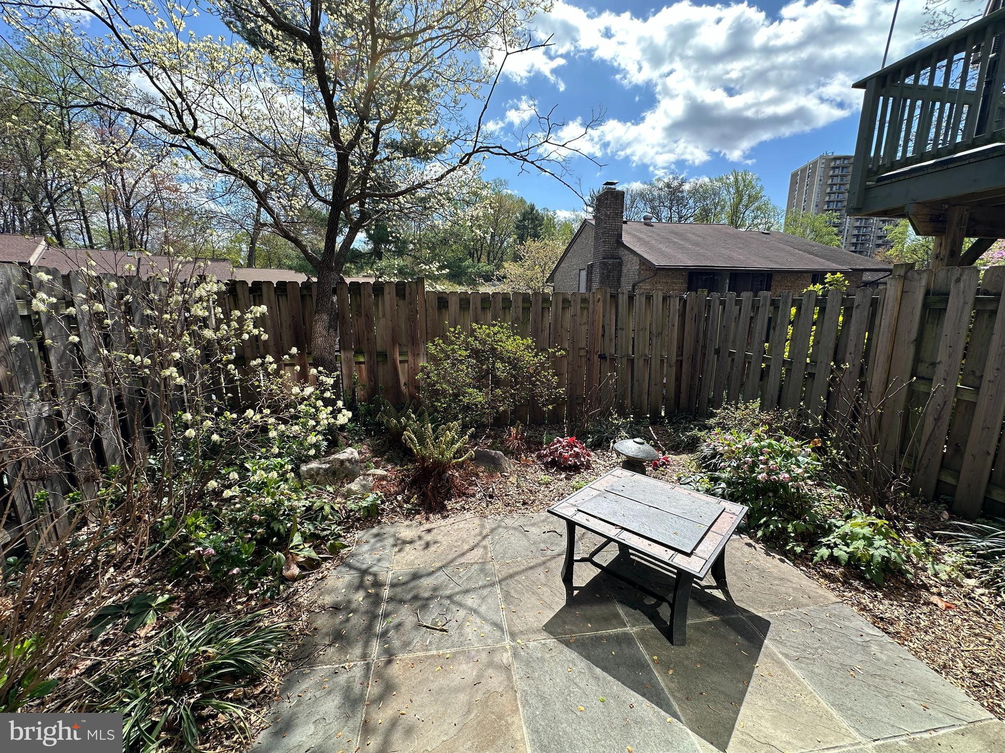 9238 Three Oaks Drive Silver Spring, MD 20901 - Photo 39 of 42 a garden view with a seating space