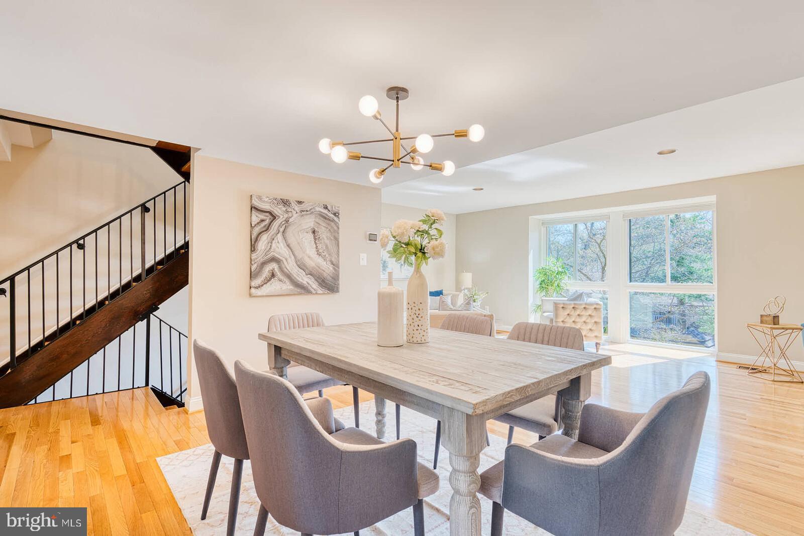 9238 Three Oaks Drive Silver Spring, MD 20901 - Photo 4 of 42 a view of a dining room with furniture window and outside view
