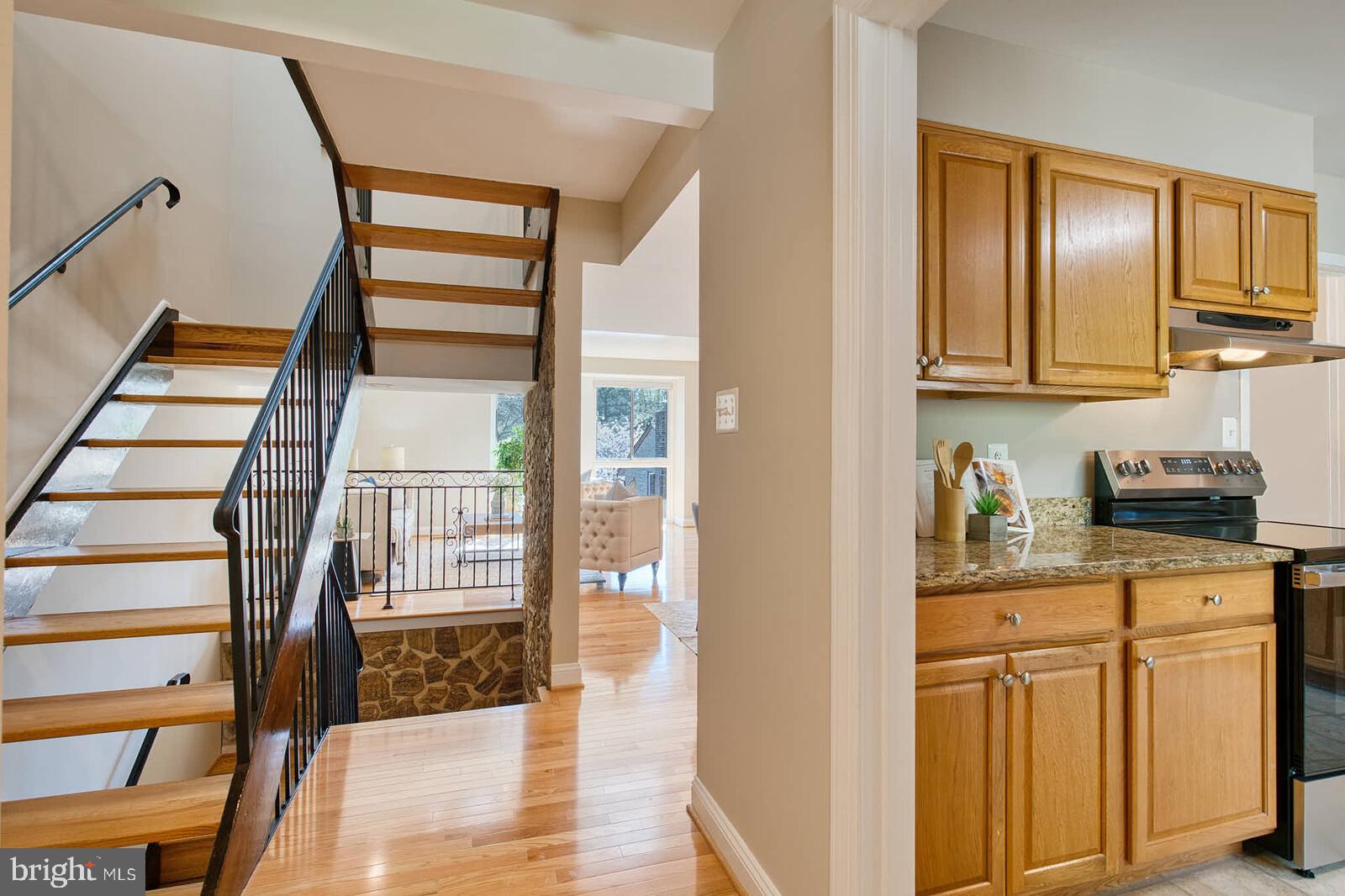 9238 Three Oaks Drive Silver Spring, MD 20901 - Photo 10 of 42 a view of a kitchen from the entryway
