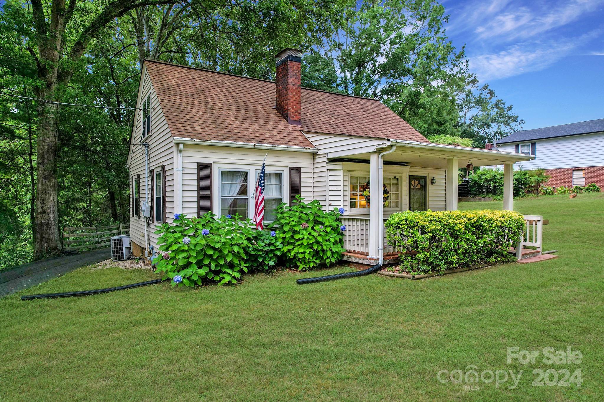 a view of a house with garden