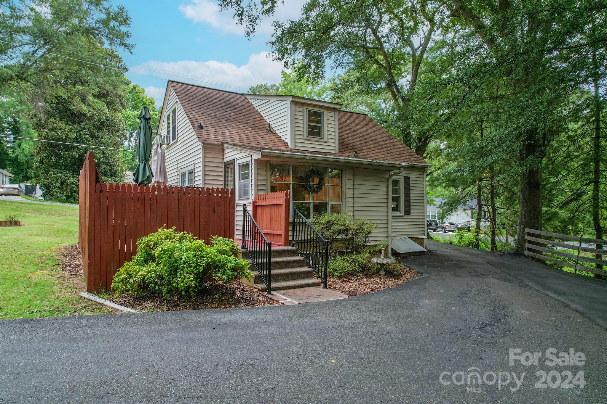 613 Dellinger Road Shelby, NC 28152 - Photo 15 of 19 a front view of a house with garden