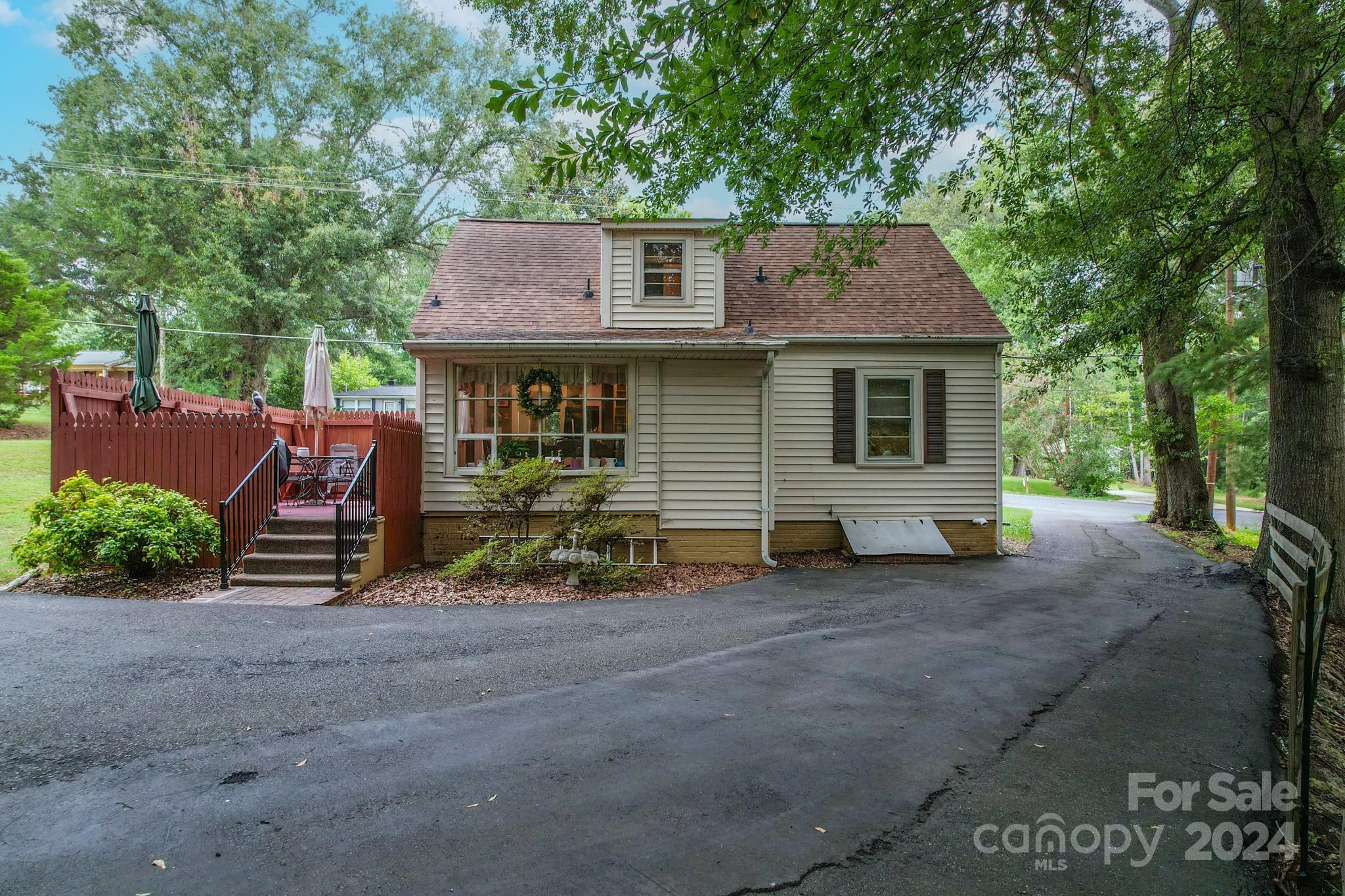 613 Dellinger Road Shelby, NC 28152 - Photo 16 of 19 a view of a house with a yard