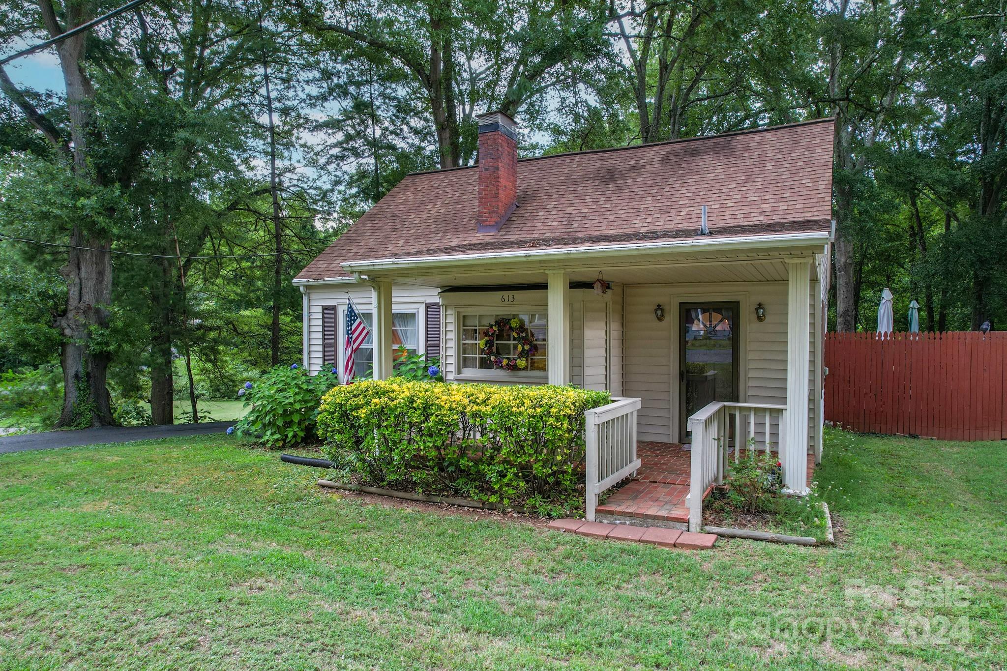 613 Dellinger Road Shelby, NC 28152 - Photo 19 of 19 a view of a house with a yard potted plants and large tree