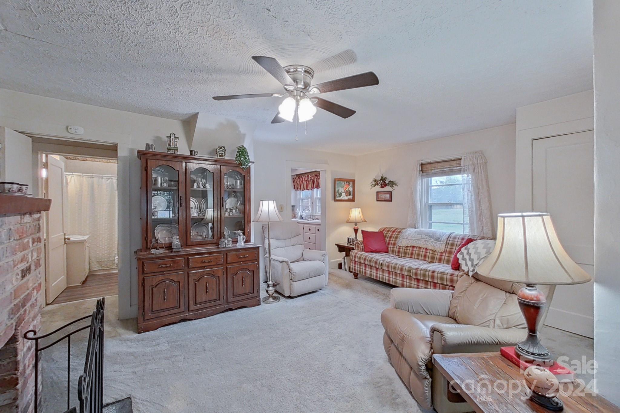 613 Dellinger Road Shelby, NC 28152 - Photo 3 of 19 a living room with furniture and wooden floor