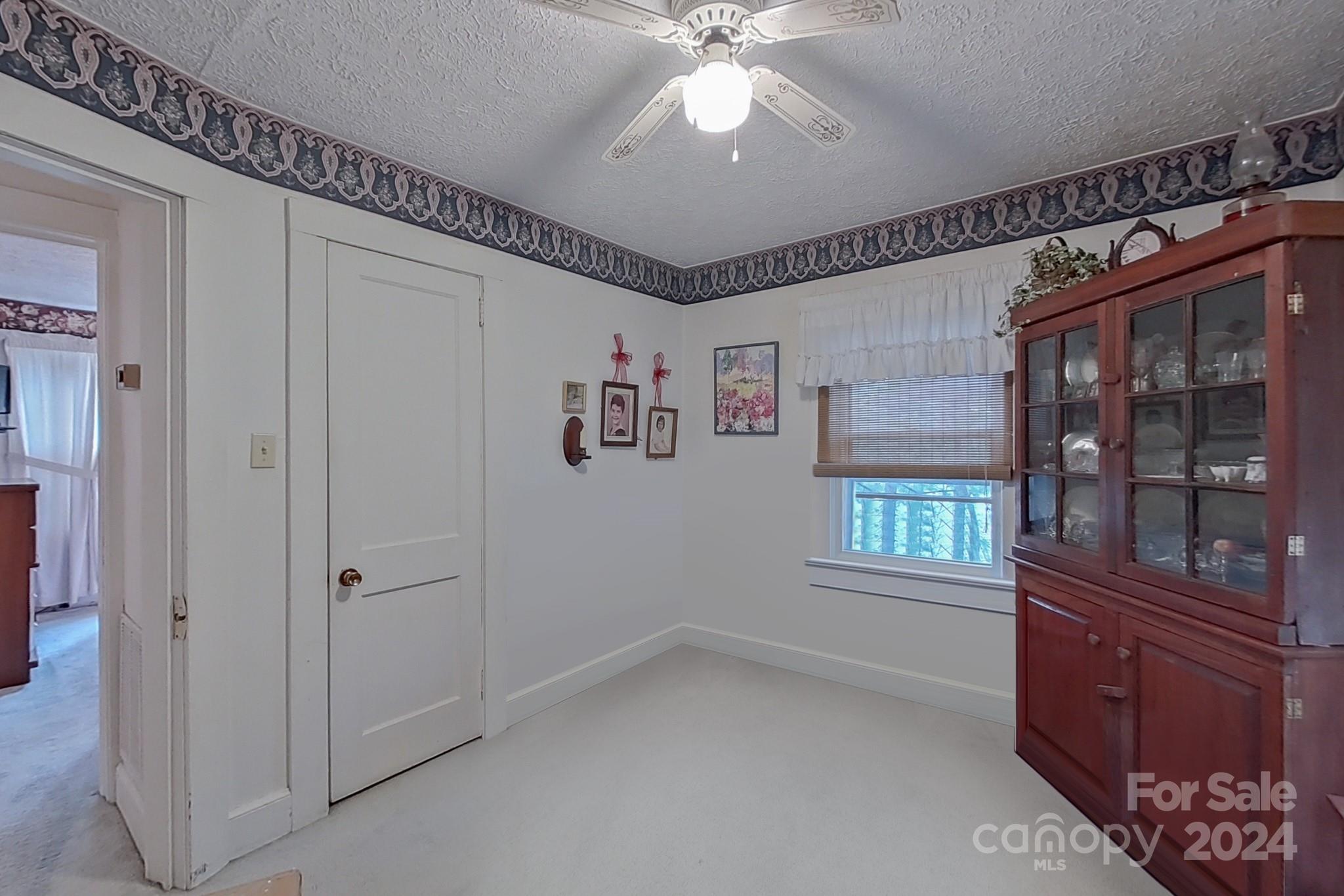 613 Dellinger Road Shelby, NC 28152 - Photo 10 of 19 wooden floor in an empty room with a window