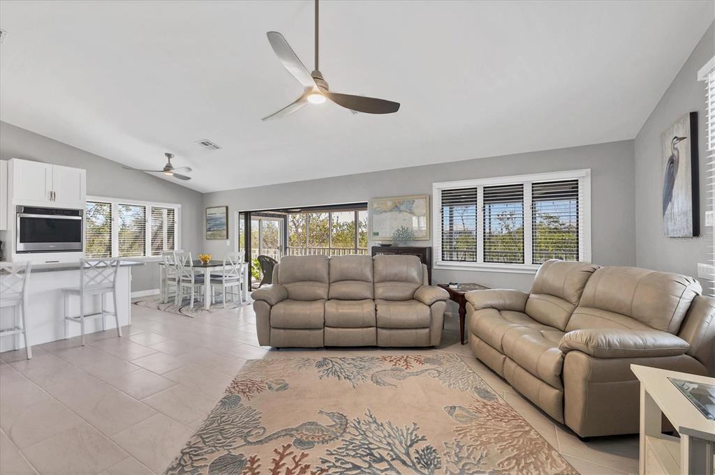 331 Bocilla Drive Boca Grande, FL 33921 - Photo 12 of 34 a living room with furniture and a flat screen tv