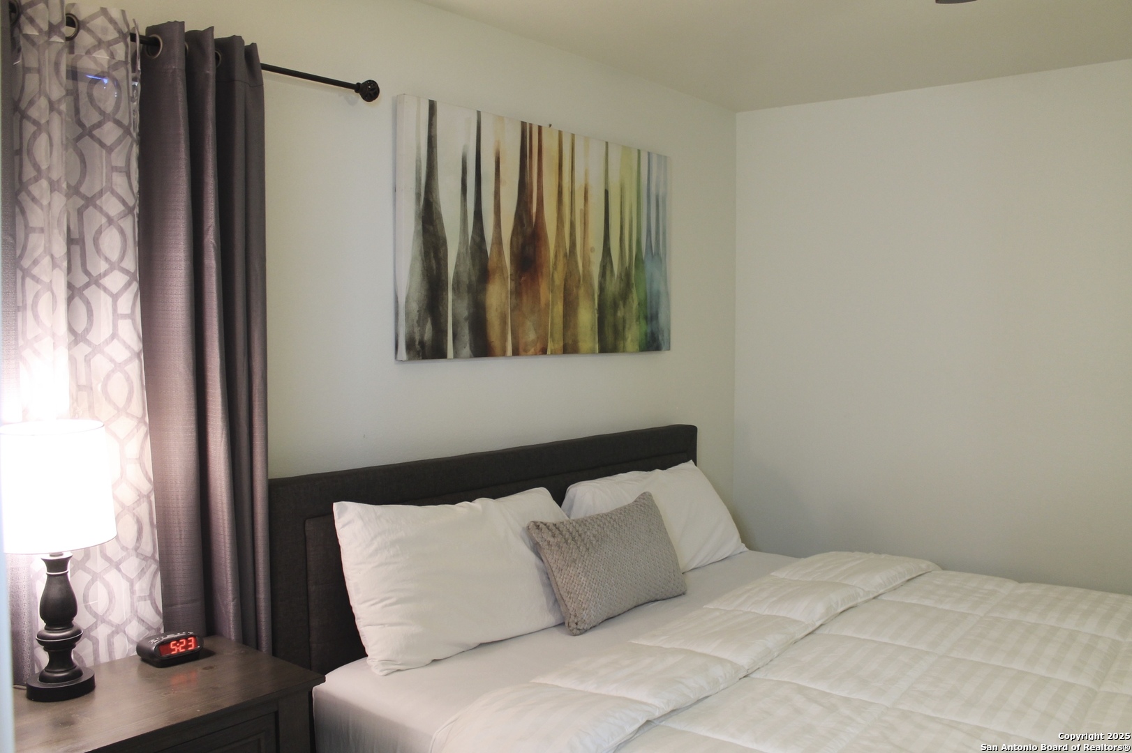 391 Riverside Drive, Unit 19 Eagle Pass, TX 78852 - Photo 7 of 13 a bedroom with a bed and a window