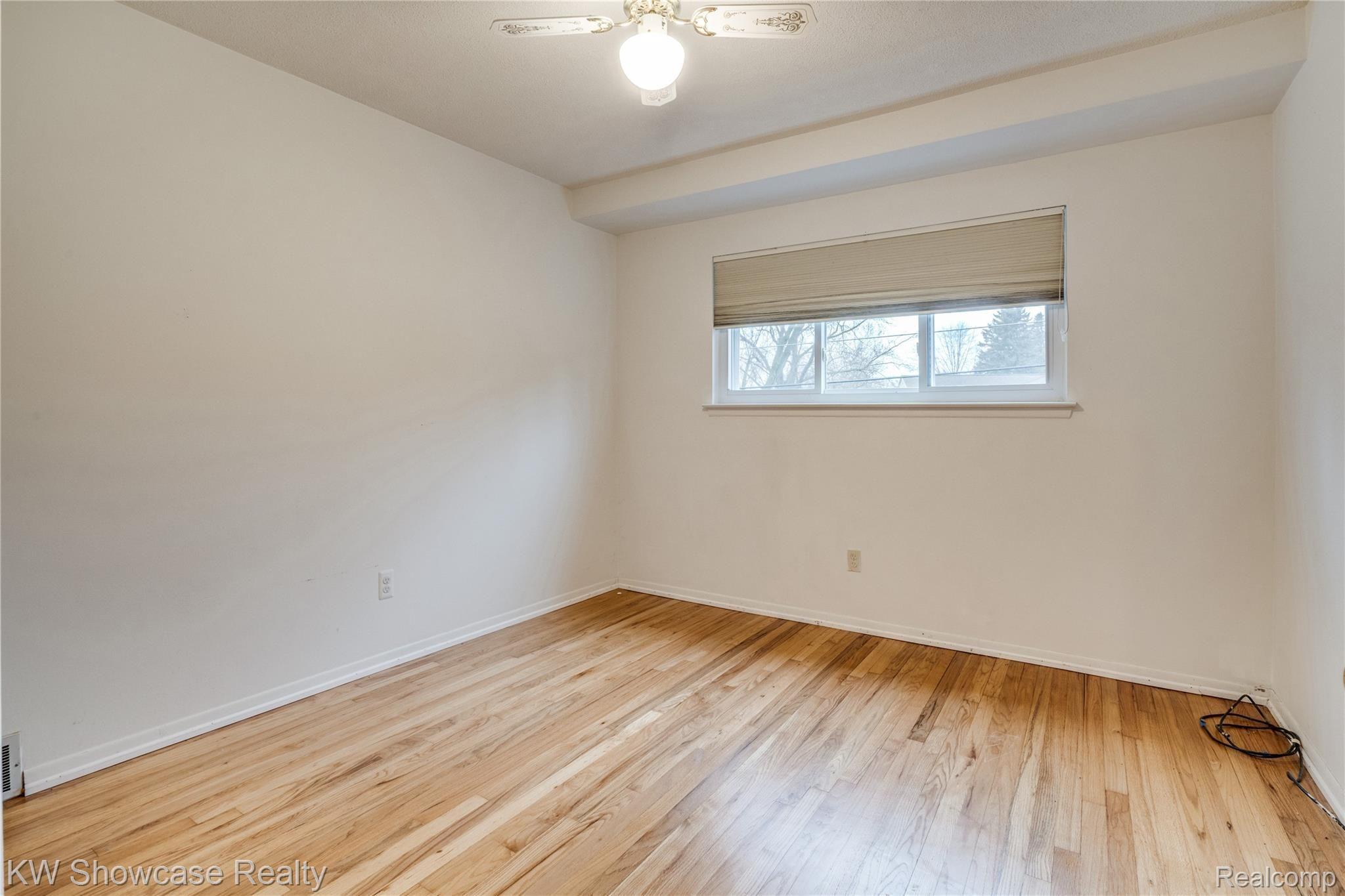 2129 Welch Road Walled Lake, MI 48390 - Photo 18 of 26 The majority of the home has beautiful hardwood floors.